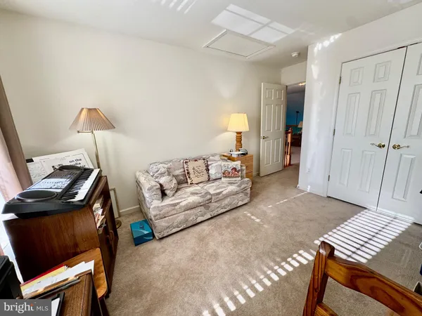 a view of a patio with couple of chairs