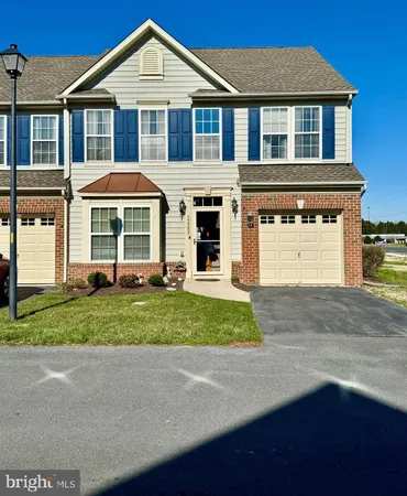 a room with furniture and a wooden floor