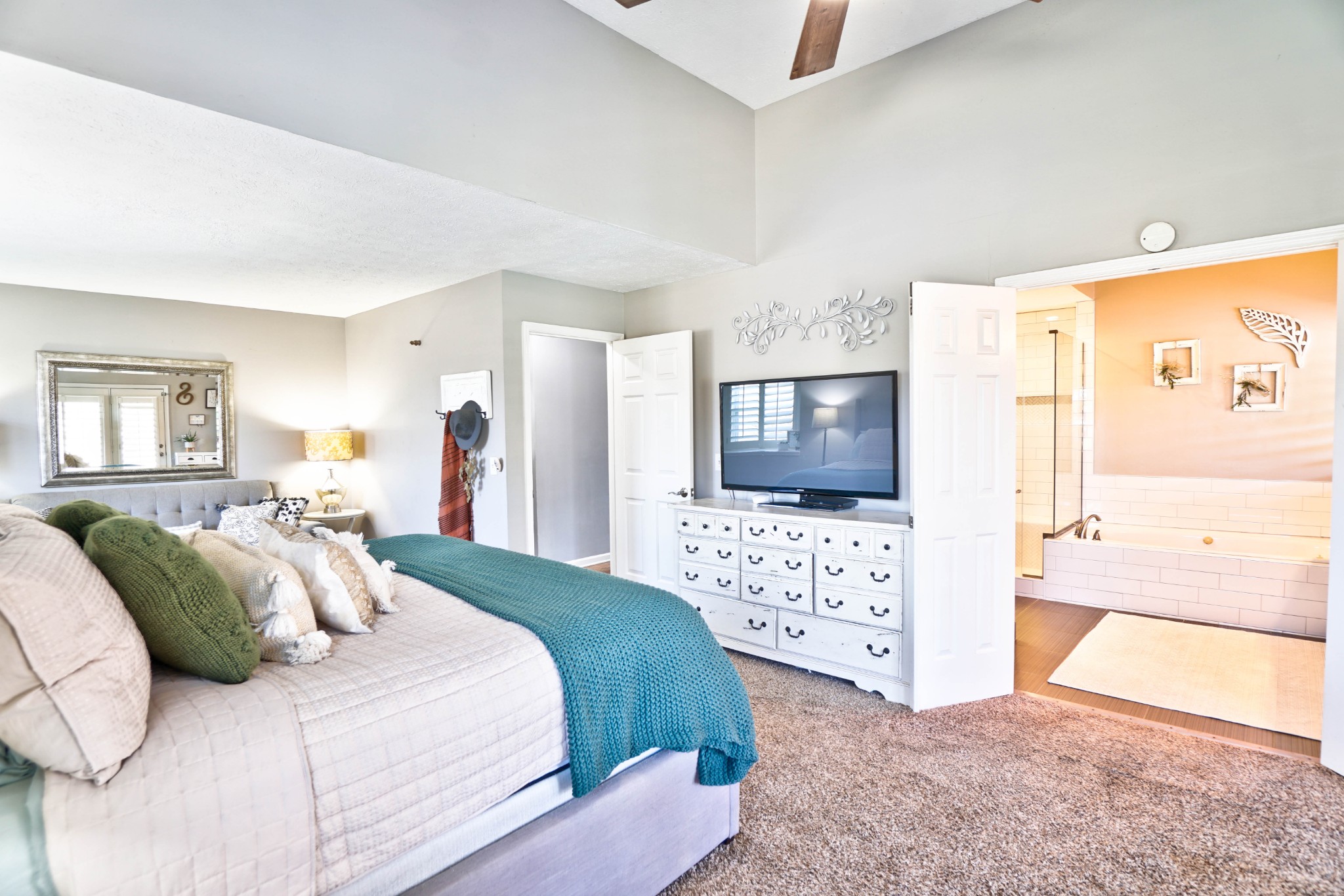 5871 Cane Ridge Road Antioch, TN 37013 - Photo 16 of 40 a bedroom with a bed and a flat screen tv