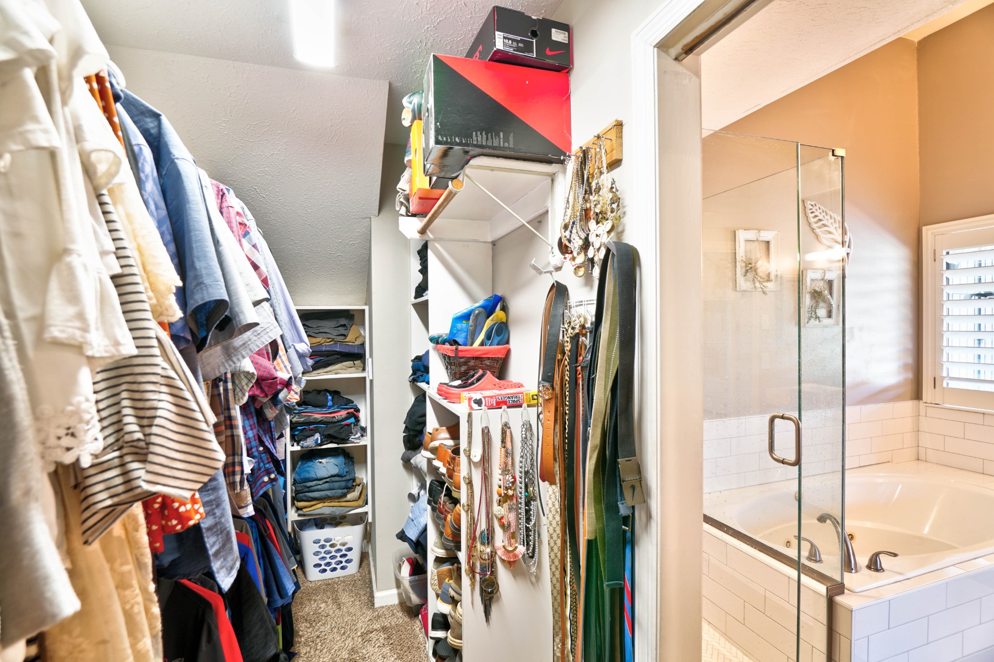 5871 Cane Ridge Road Antioch, TN 37013 - Photo 21 of 40 a view of walk in closet with clothes and shoes