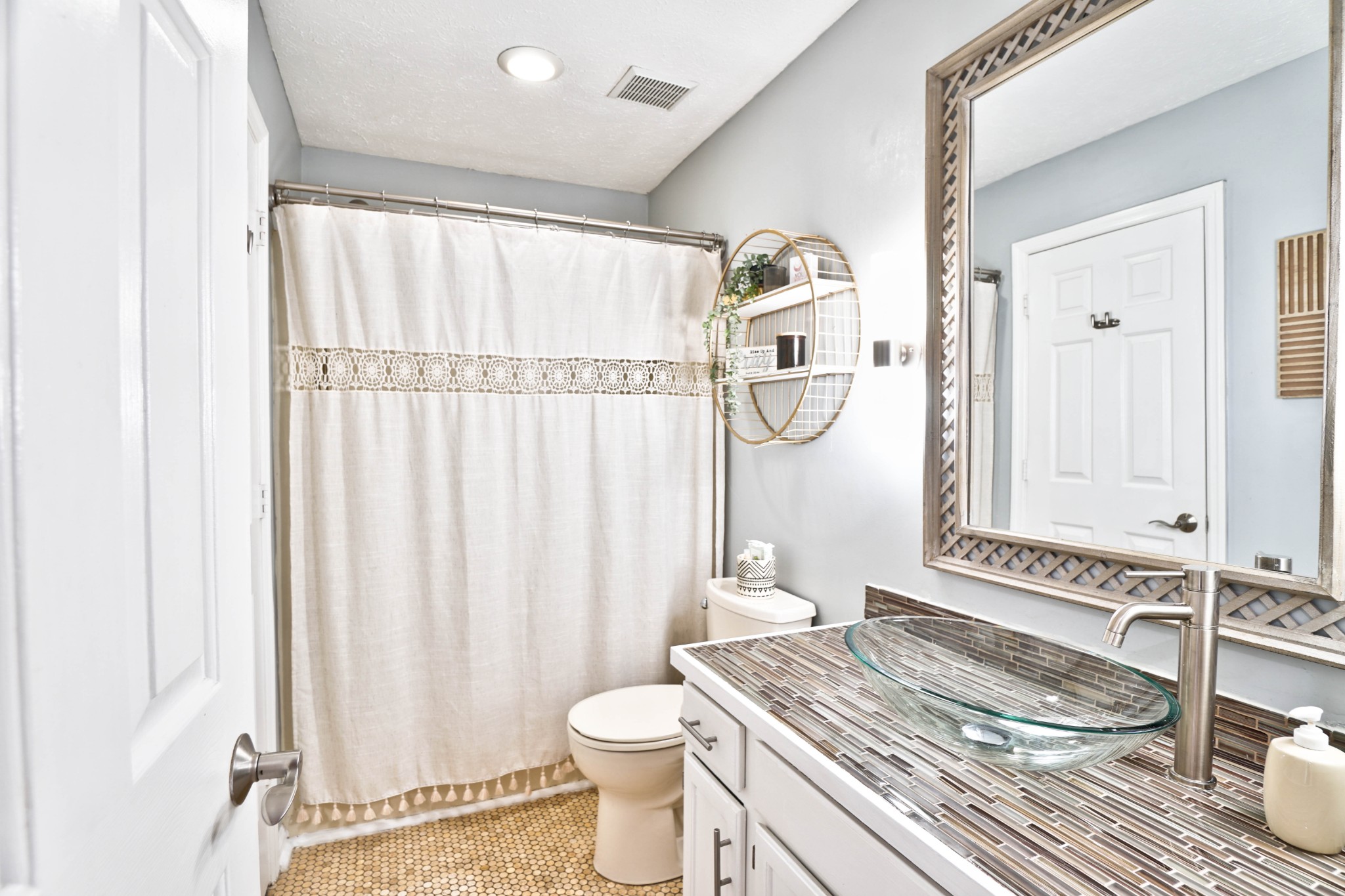 5871 Cane Ridge Road Antioch, TN 37013 - Photo 24 of 40 a bathroom with a granite countertop sink and a mirror