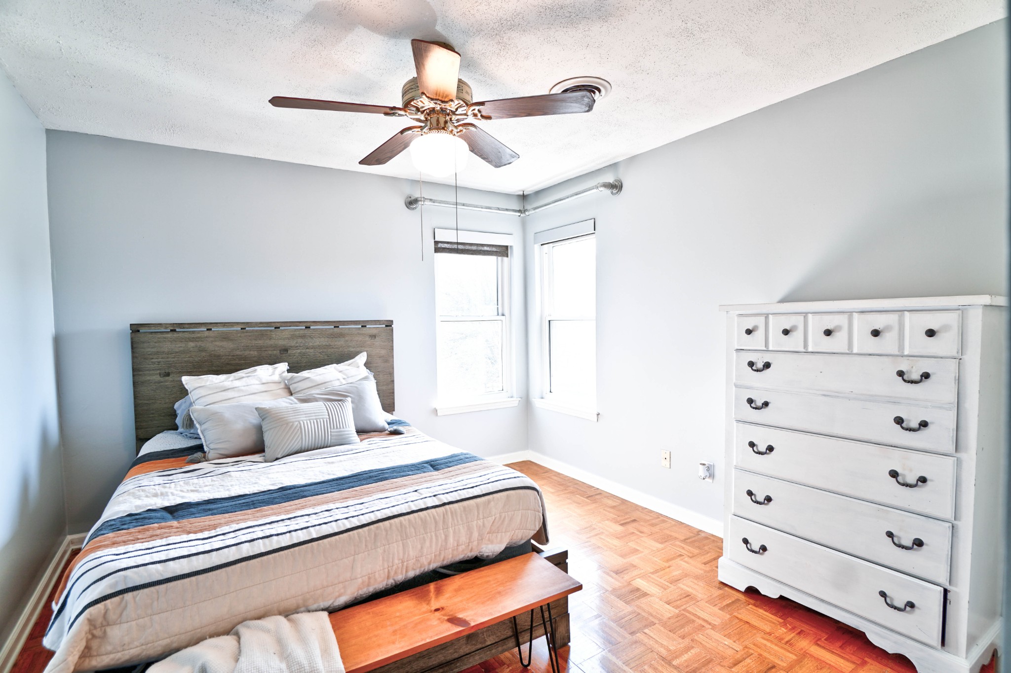 5871 Cane Ridge Road Antioch, TN 37013 - Photo 29 of 40 a bedroom with a bed and a ceiling fan