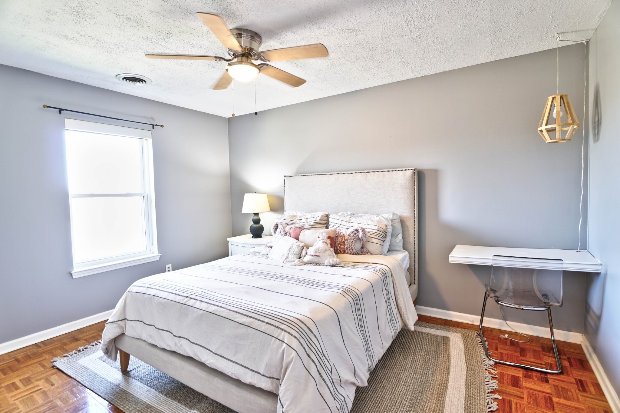 5871 Cane Ridge Road Antioch, TN 37013 - Photo 30 of 40 a bedroom with a bed and a table