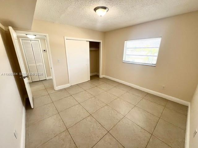 685 Northeast 85th Street, Unit 8 Miami, FL 33138 - Photo 4 of 6 a view of an empty room