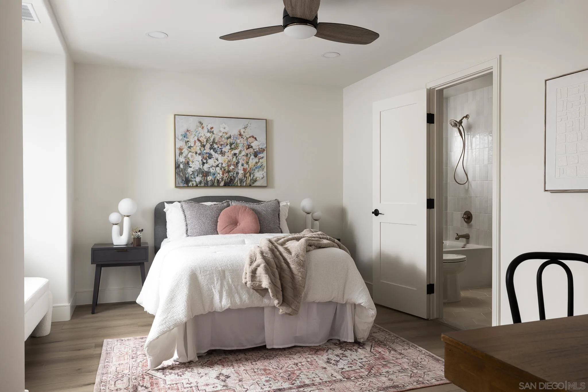 614 Ezee Street Encinitas, CA 92024 - Photo 15 of 41 a bedroom with a bed and a dresser