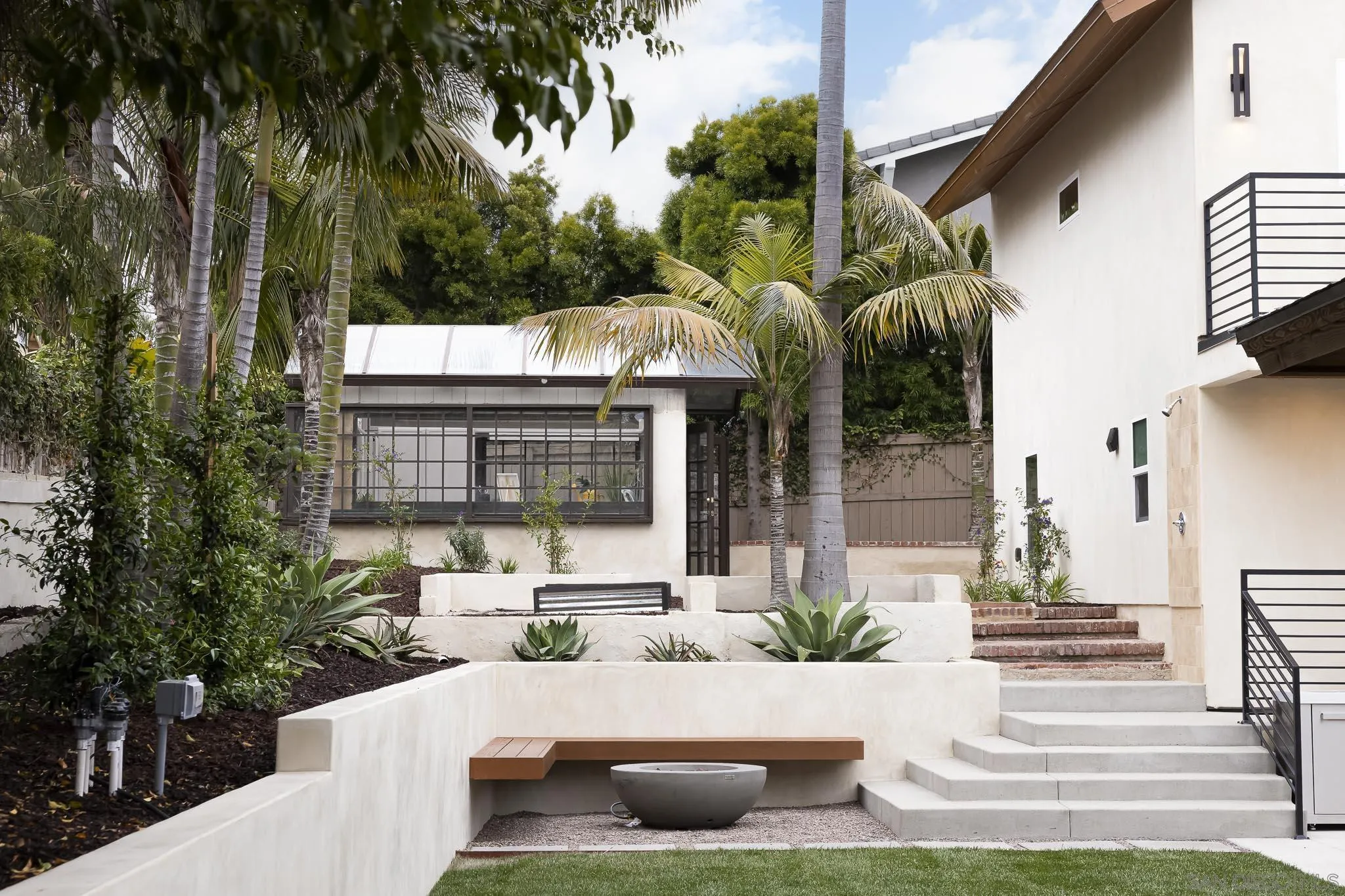 614 Ezee Street Encinitas, CA 92024 - Photo 21 of 41 a view of a house with backyard and sitting area