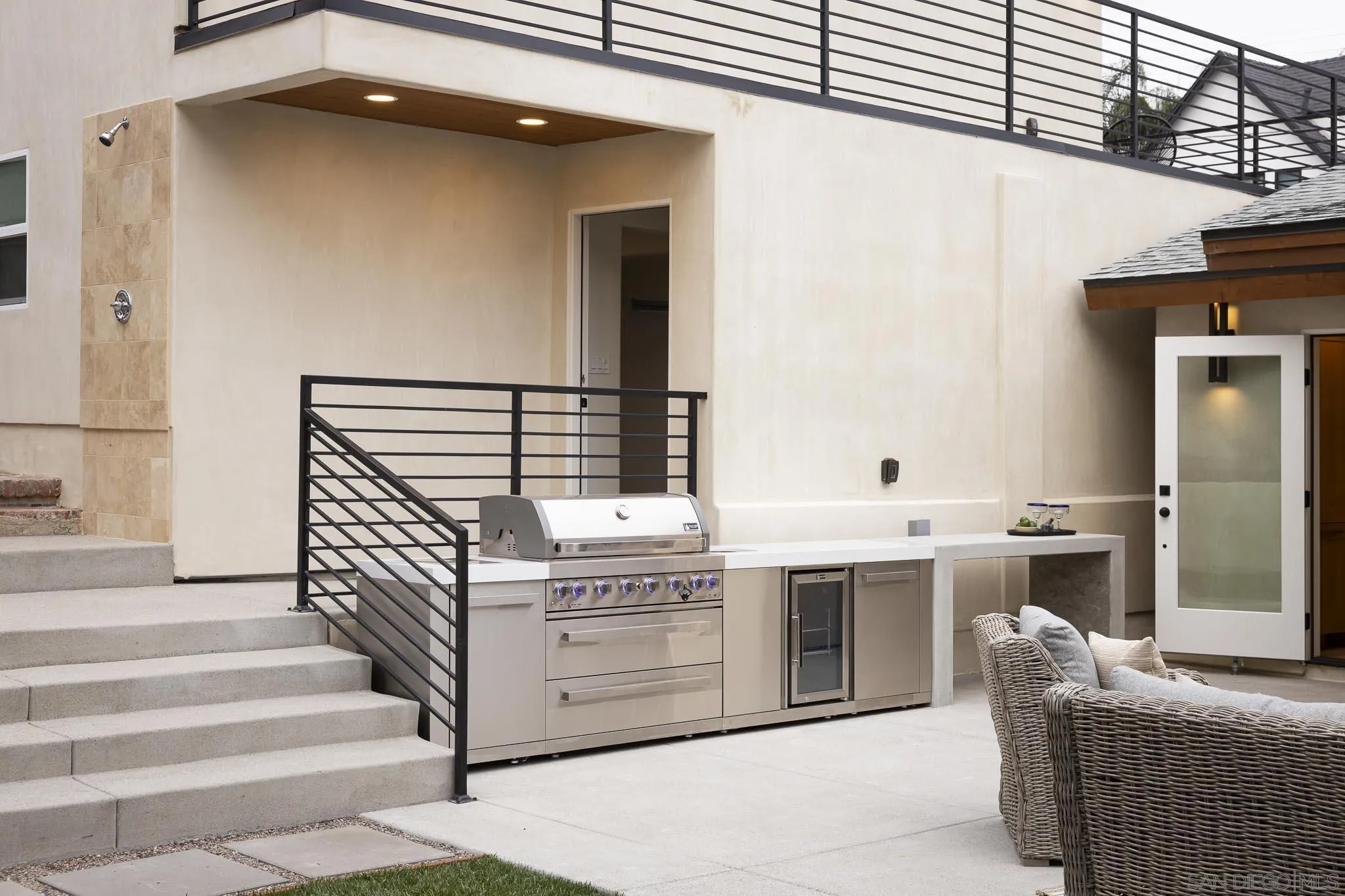 614 Ezee Street Encinitas, CA 92024 - Photo 22 of 41 a bathroom with a sink and a mirror