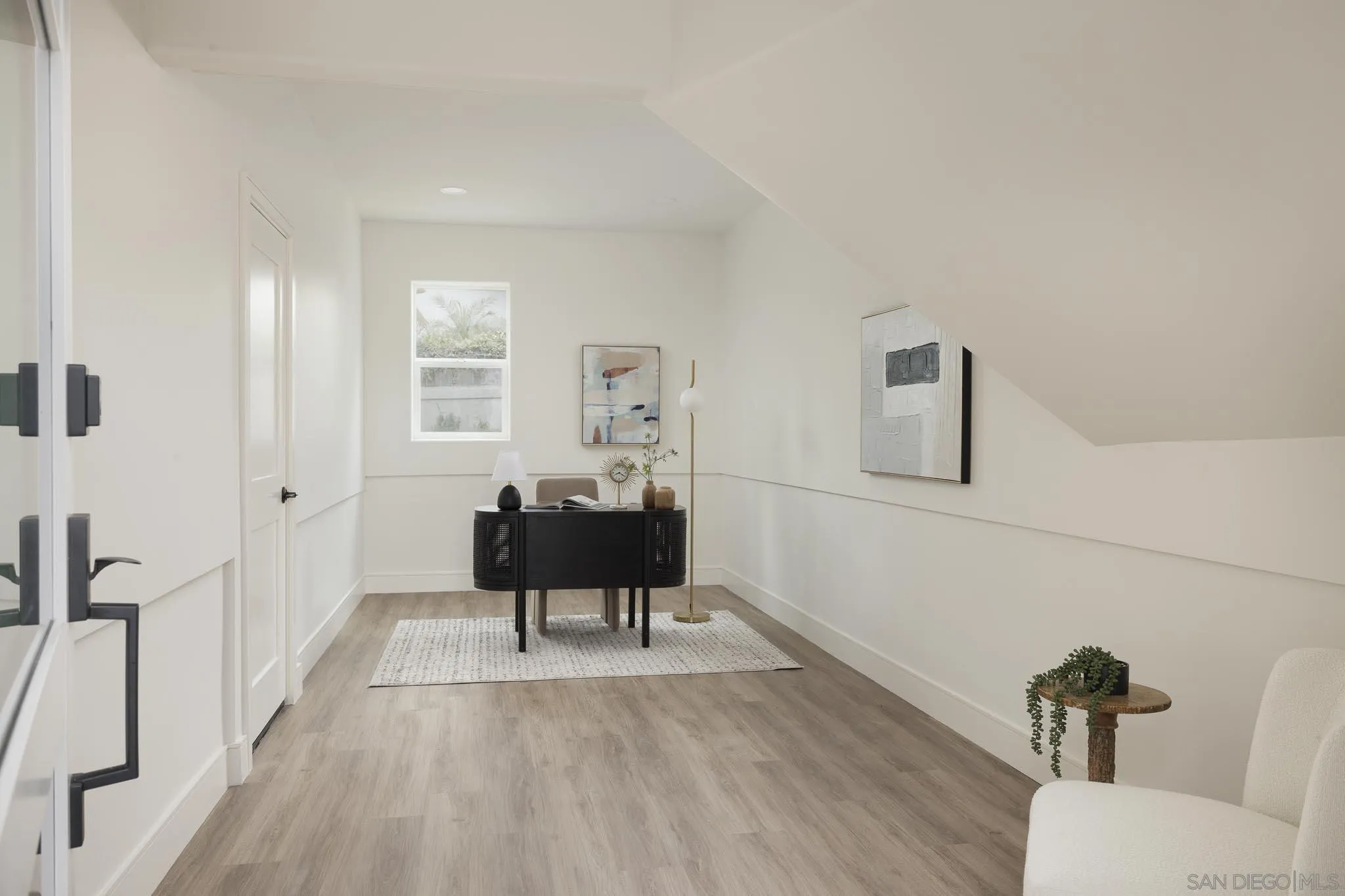 614 Ezee Street Encinitas, CA 92024 - Photo 23 of 41 a living room with furniture and a potted plant