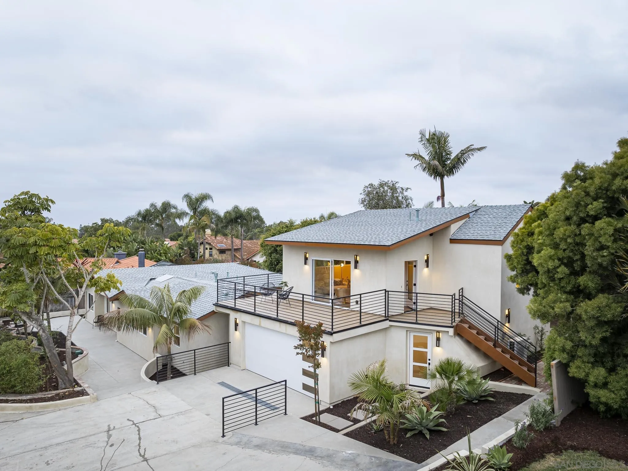 614 Ezee Street Encinitas, CA 92024 - Photo 24 of 41 a front view of a house with garden