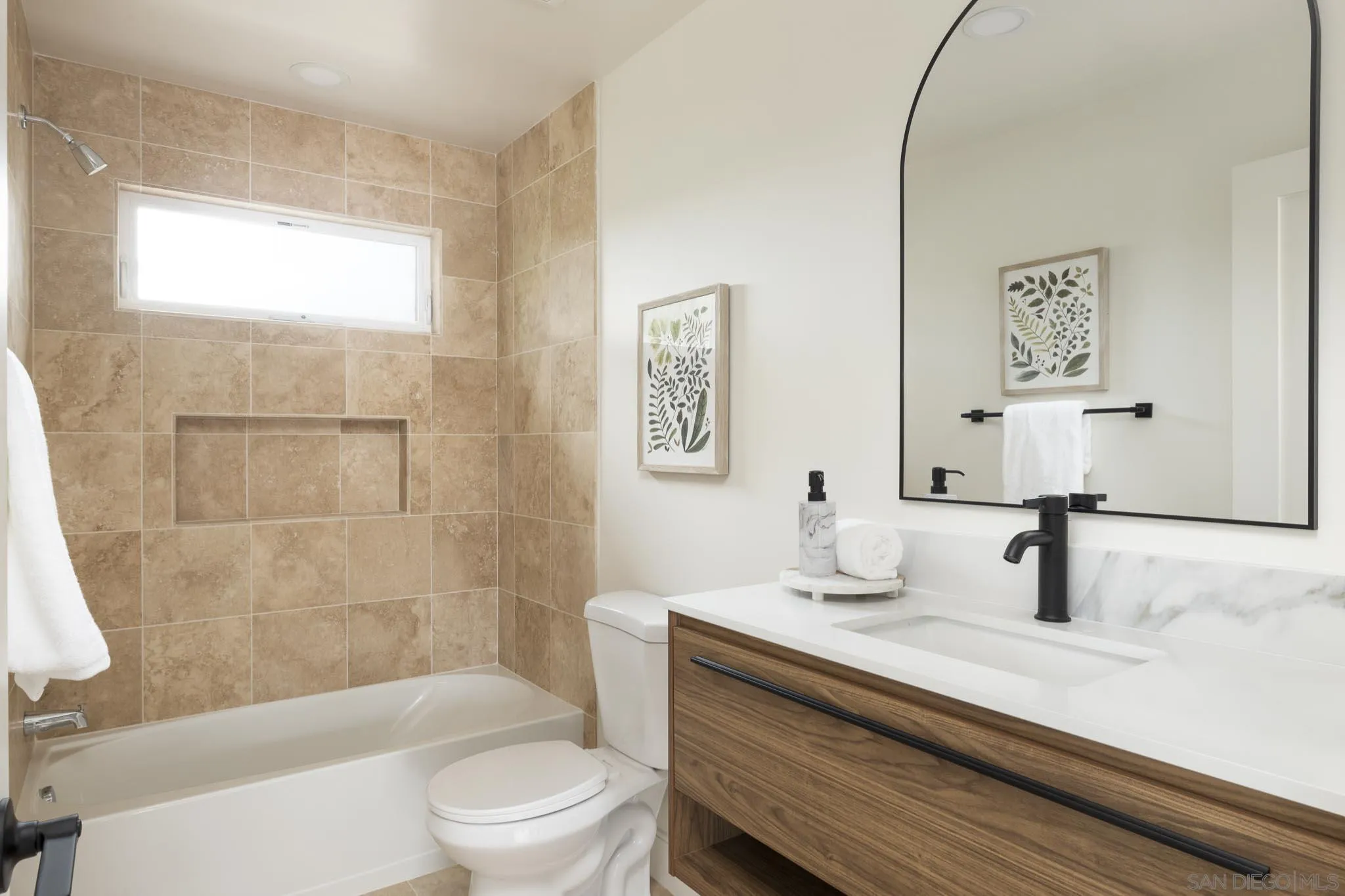 614 Ezee Street Encinitas, CA 92024 - Photo 29 of 41 a bathroom with a sink a toilet and a bathtub