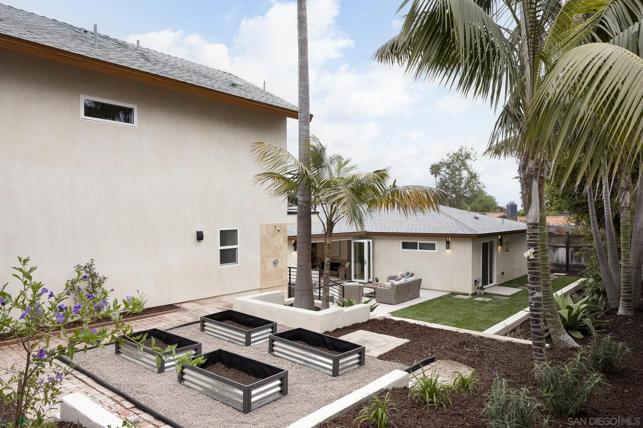 614 Ezee Street Encinitas, CA 92024 - Photo 35 of 41 a front view of a house with swimming pool