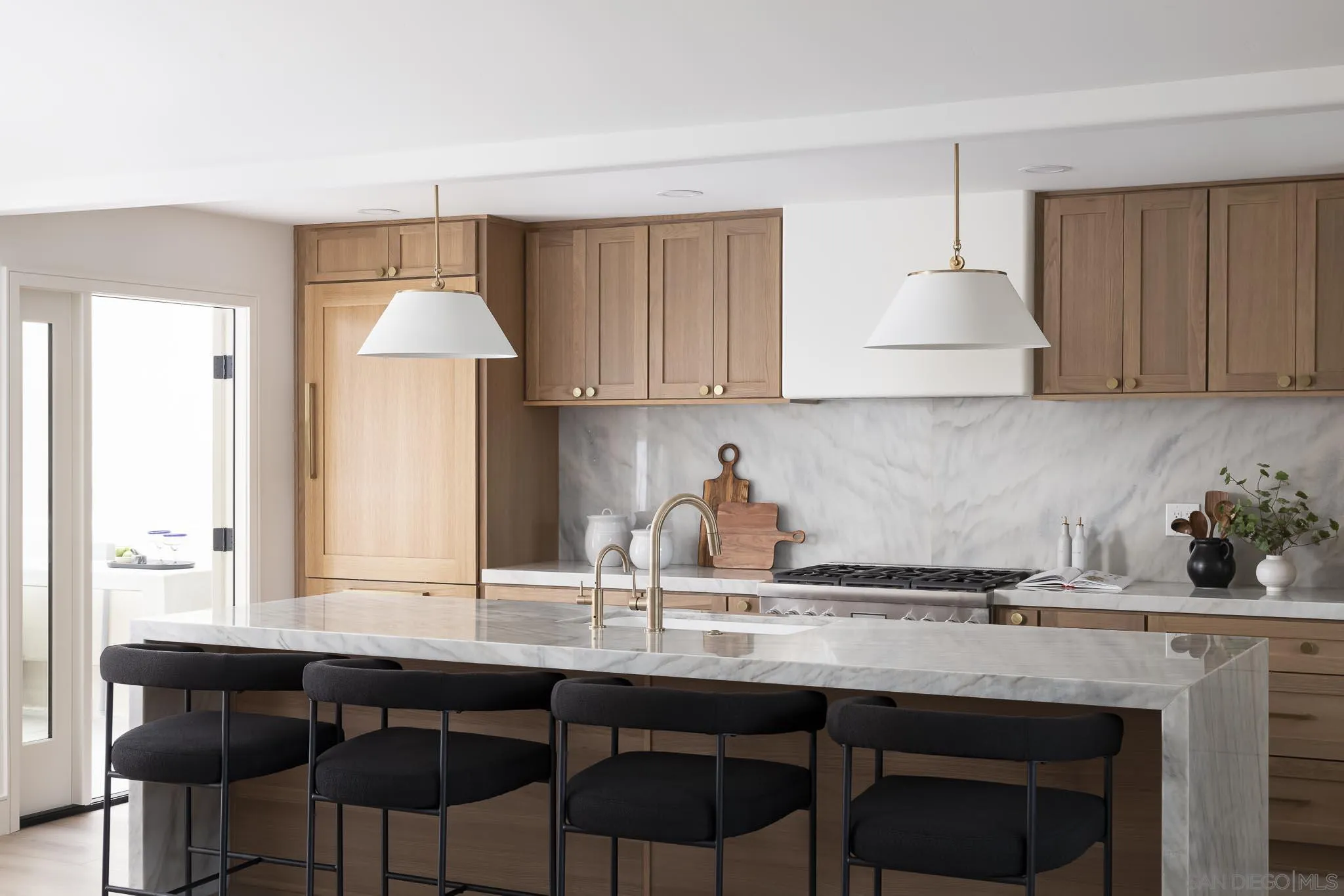 614 Ezee Street Encinitas, CA 92024 - Photo 8 of 41 a kitchen with granite countertop a sink and a wooden cabinets