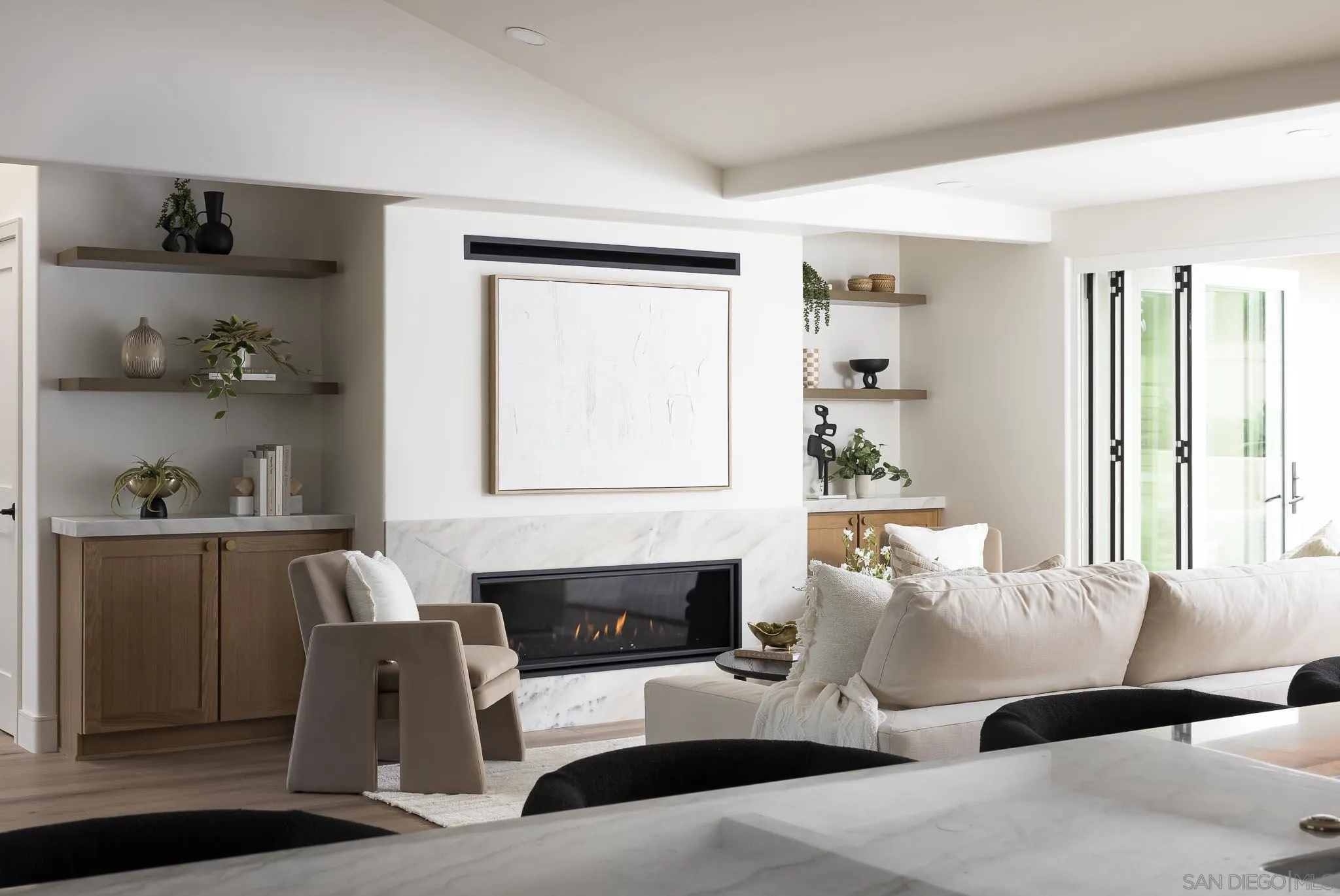 614 Ezee Street Encinitas, CA 92024 - Photo 9 of 41 a living room with furniture and a fireplace