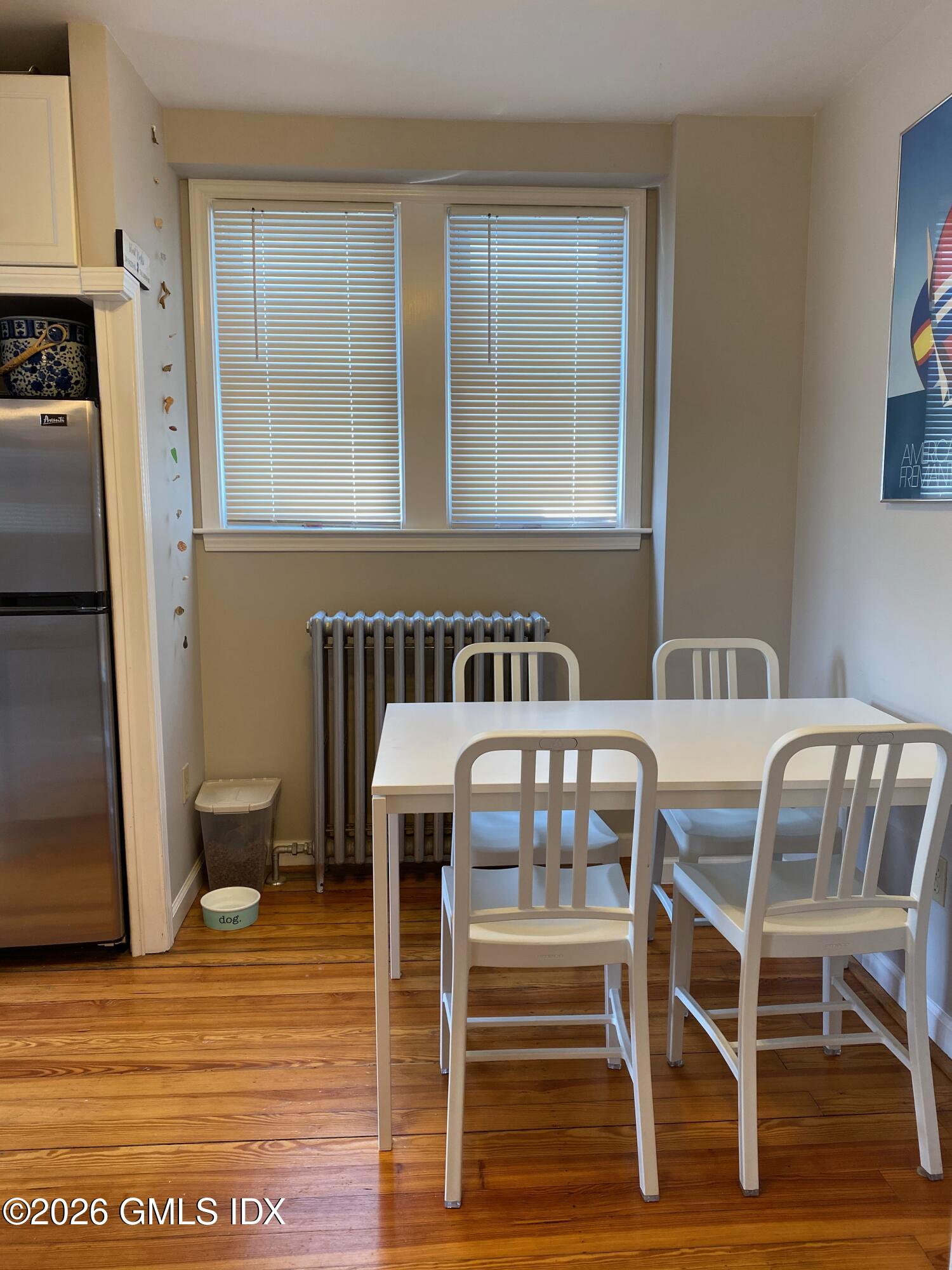 22 Division Street Greenwich, CT 06830 - Photo 16 of 29 a view of a dining room with furniture wooden floor and a carpet