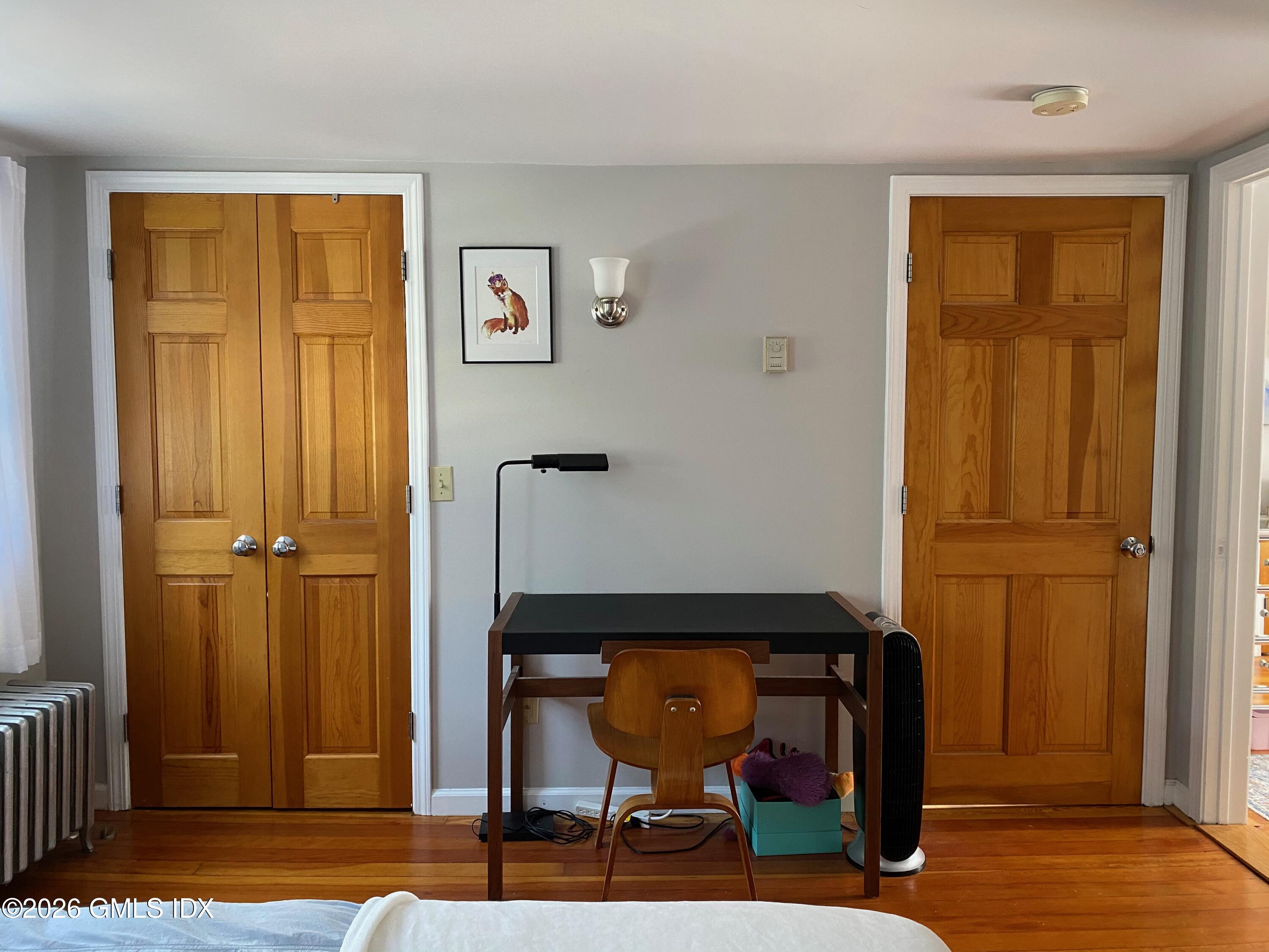 22 Division Street Greenwich, CT 06830 - Photo 23 of 29 a view of a livingroom with furniture and wooden floor
