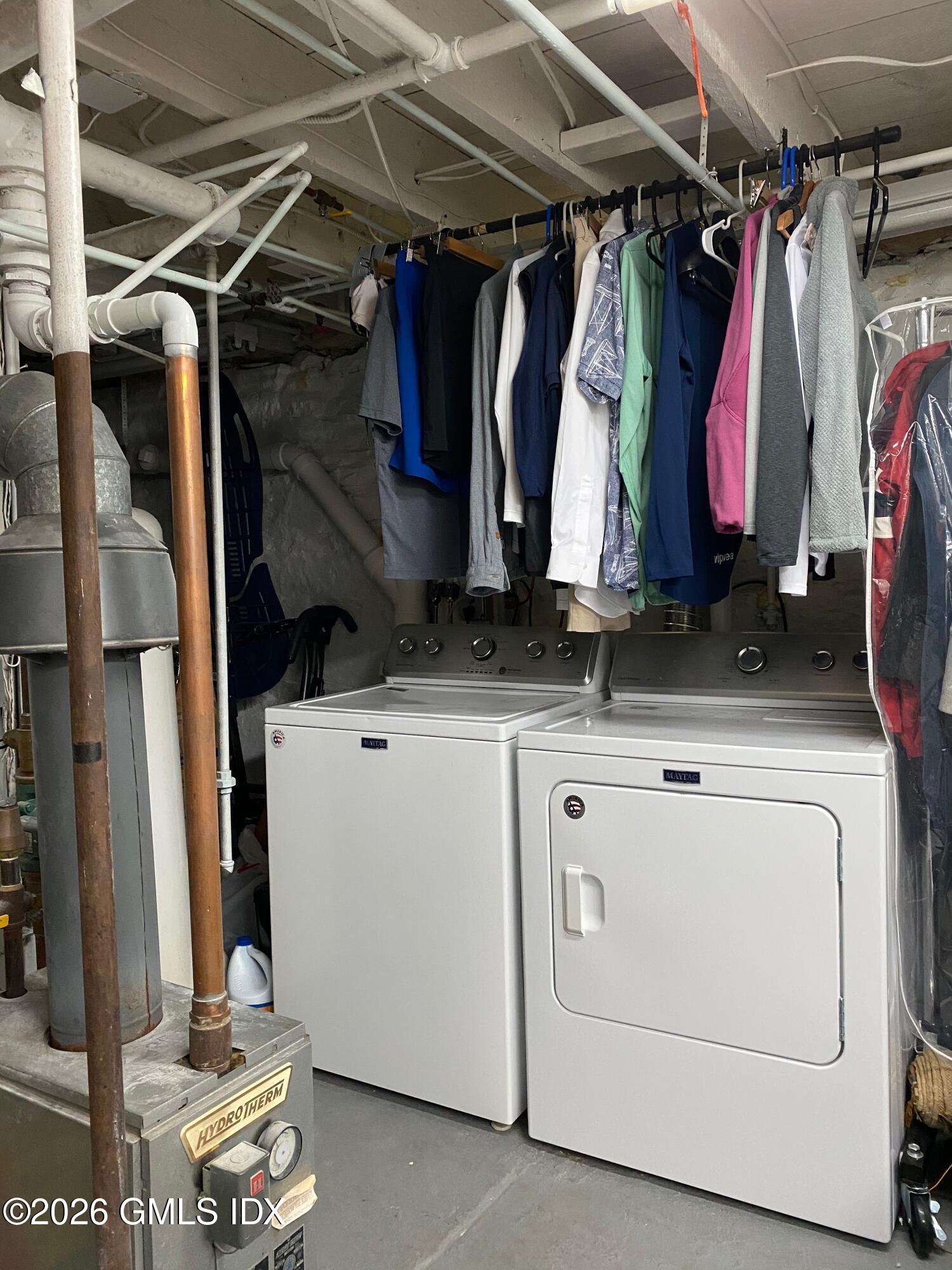 22 Division Street Greenwich, CT 06830 - Photo 26 of 29 a view of walk in closet with clothes