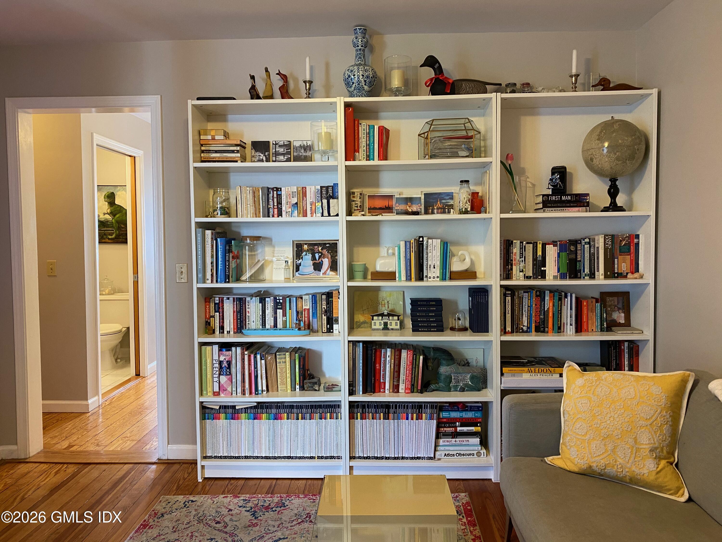 22 Division Street Greenwich, CT 06830 - Photo 7 of 29 a view of living room with furniture and book shelf