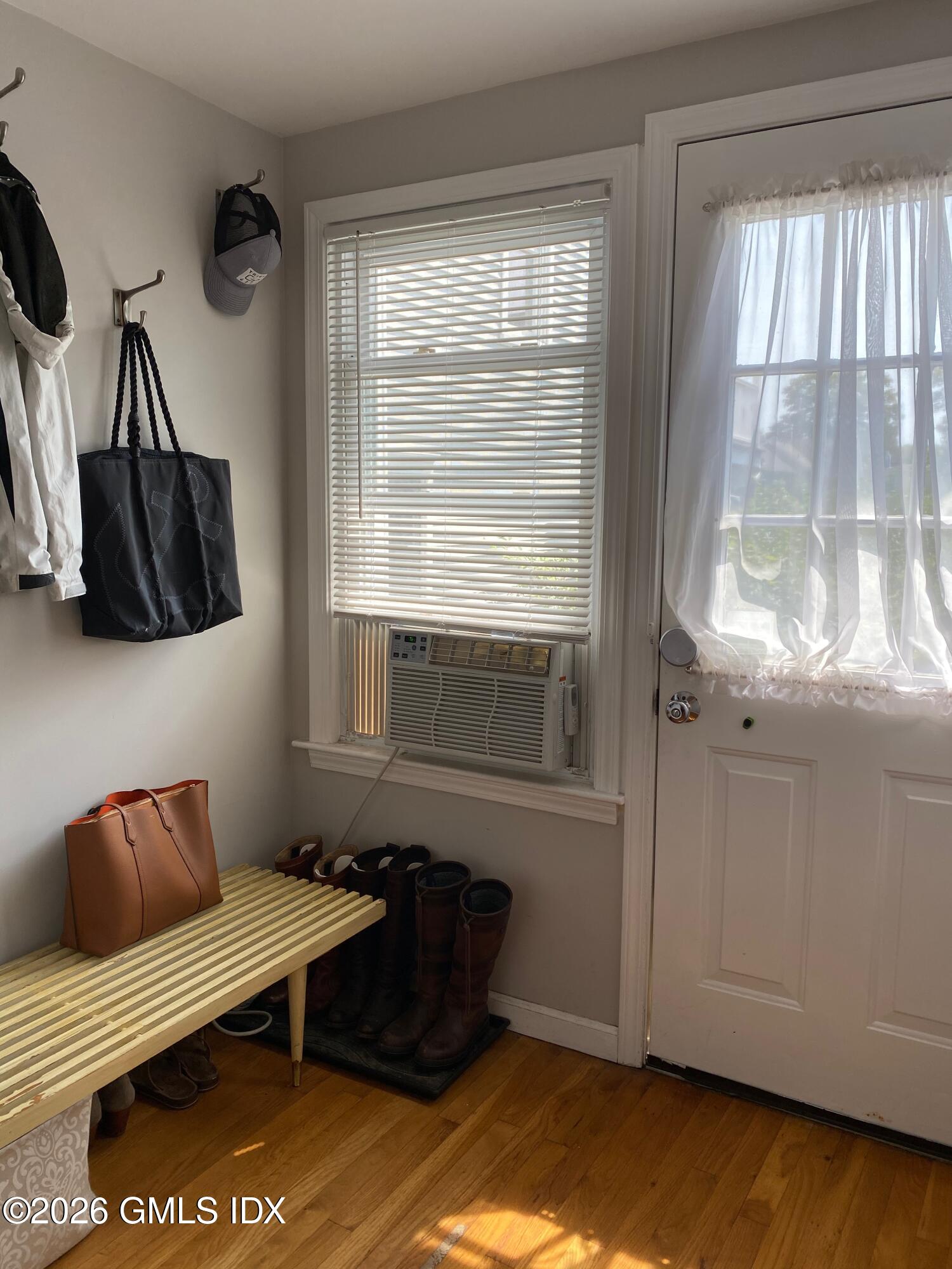 22 Division Street Greenwich, CT 06830 - Photo 10 of 29 a living room with furniture and a window