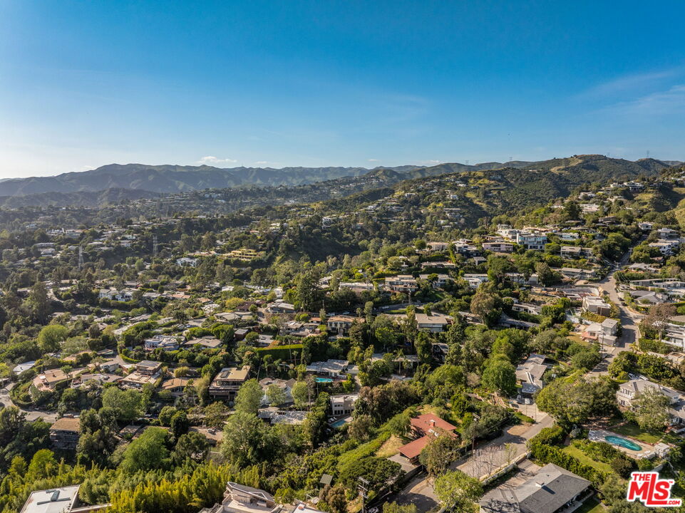 741 North Tigertail Road Los Angeles, CA 90049 - Photo 5 of 14 an aerial view of residential houses with city view