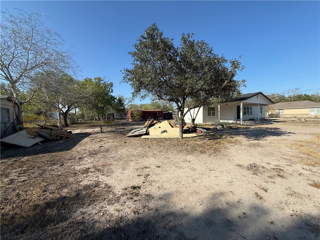 400 Austin Street George West, TX 78022 - Photo 14 of 23 a view of a house with a yard
