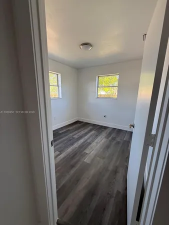 a view of room with window and stairs