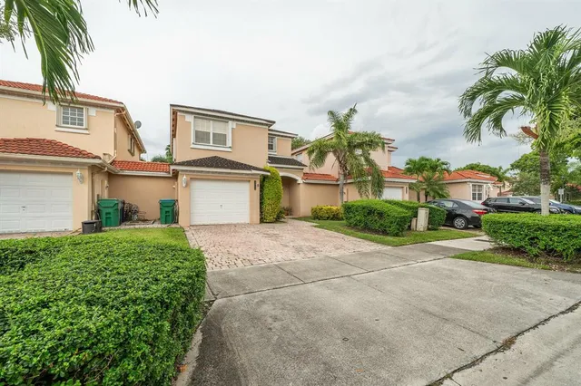 front view of a house with a street