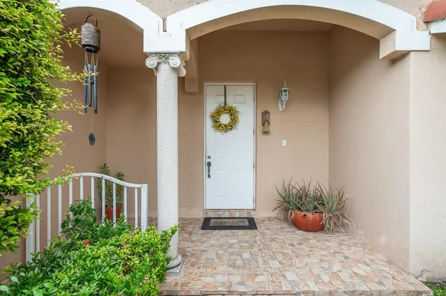 a view of a backyard of the house