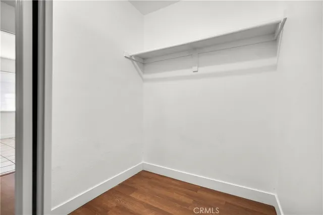 a view of small space with wooden floor