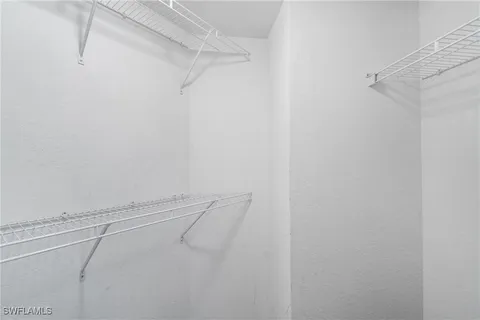 a view of a room with racks on the wall