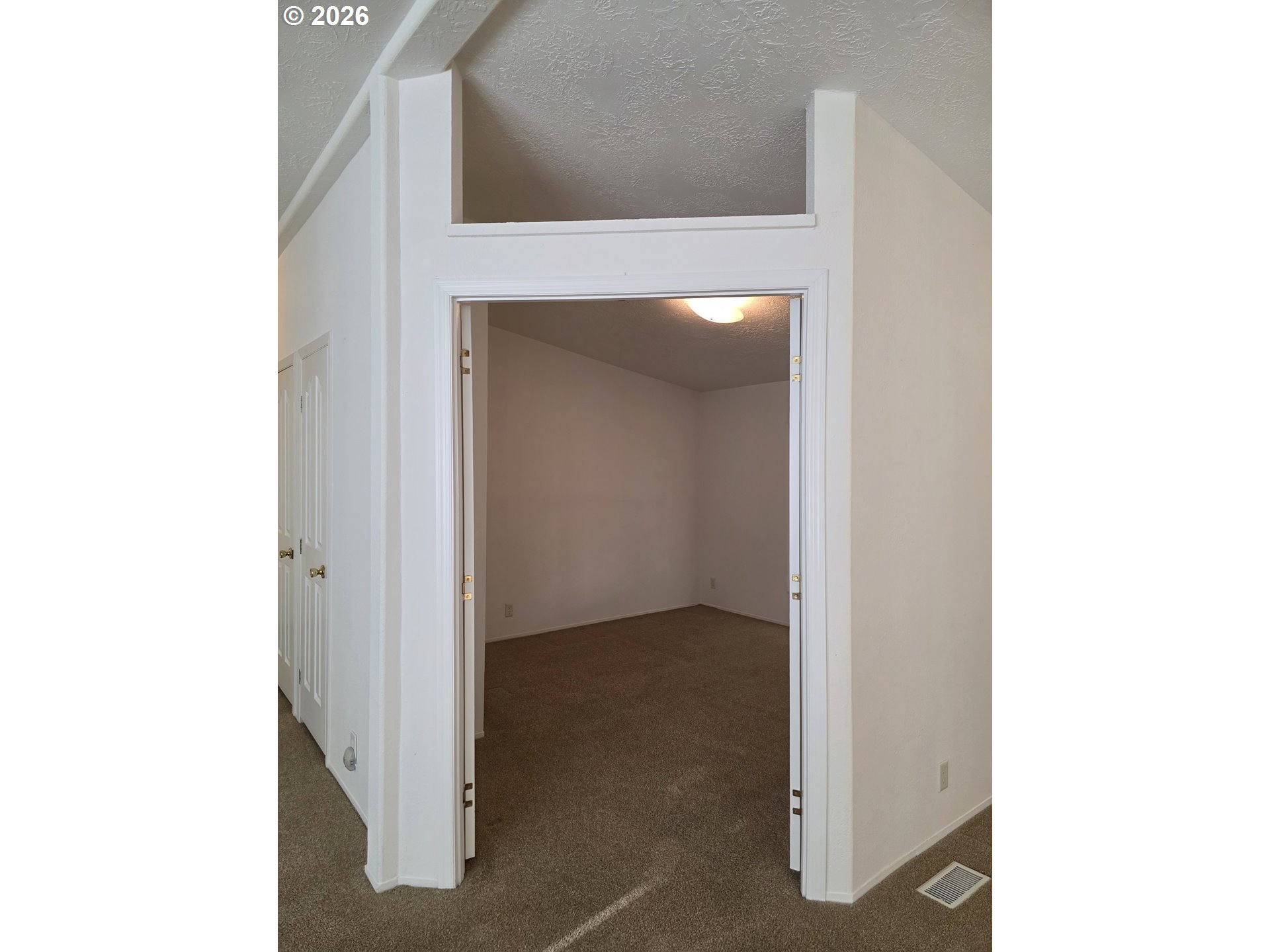 15768 Southeast Powell Boulevard, Unit 28 Portland, OR 97236 - Photo 22 of 42 a view of a hallway