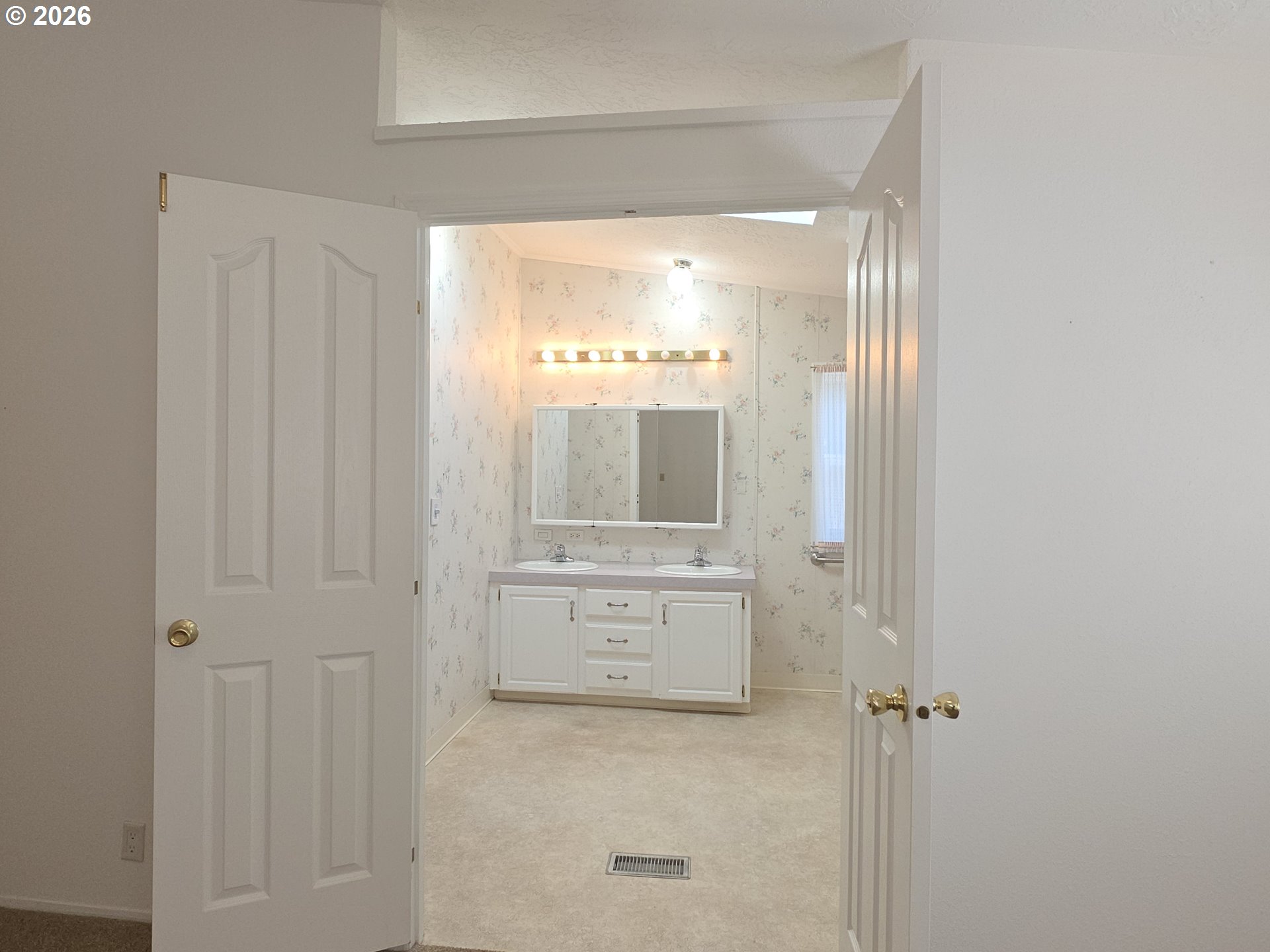 15768 Southeast Powell Boulevard, Unit 28 Portland, OR 97236 - Photo 30 of 42 a bathroom with a bathtub and shower