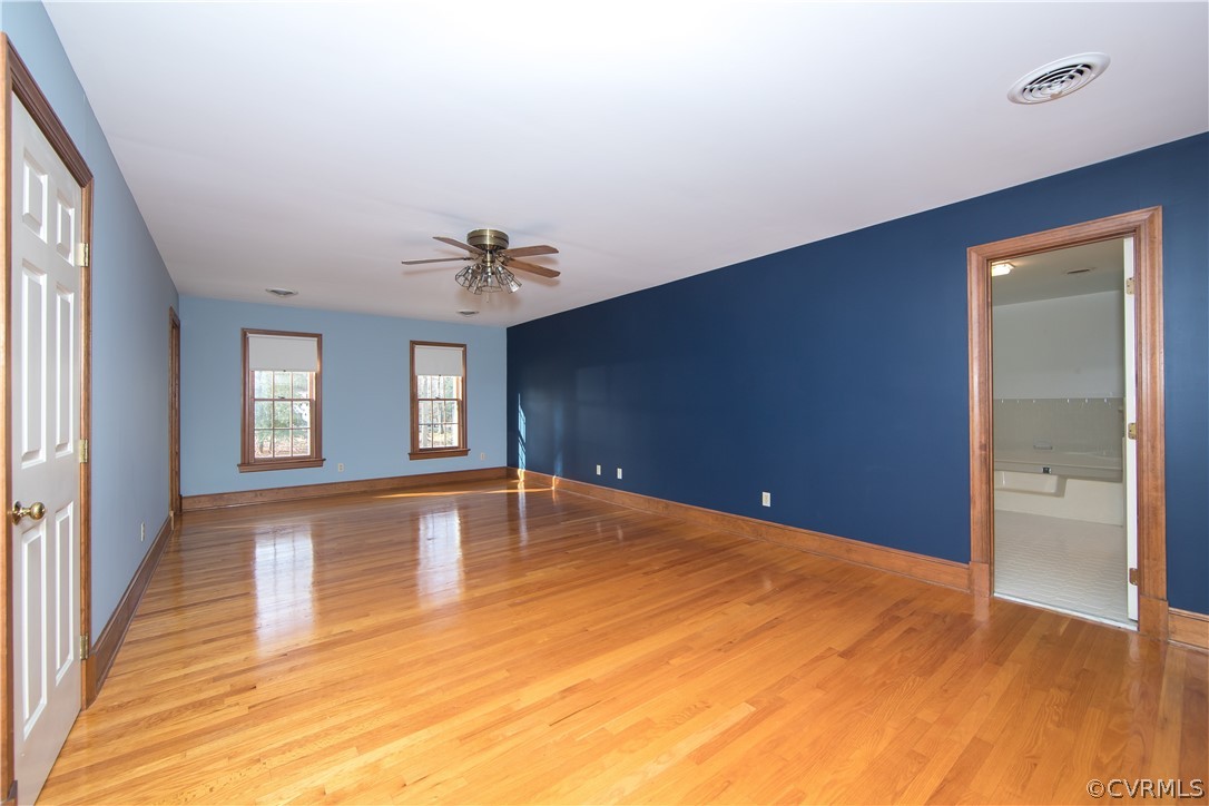 12905 Rivers Bend Road Chester, VA 23836 - Photo 15 of 27 The primary bedroom is huge! It stretches the wid
