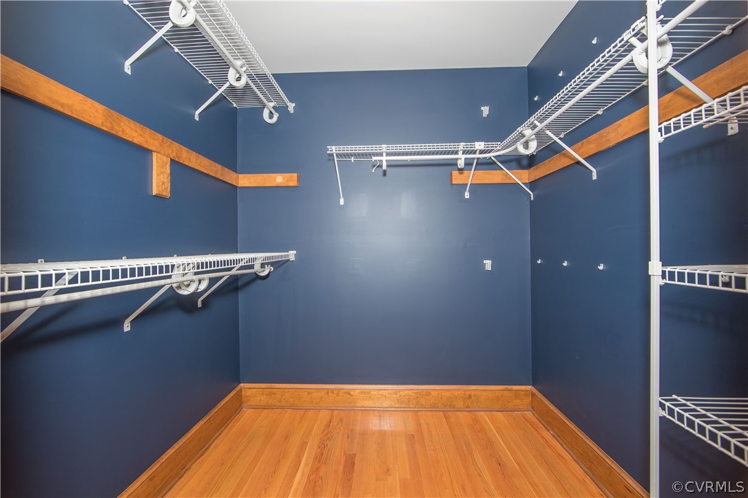 12905 Rivers Bend Road Chester, VA 23836 - Photo 18 of 27 The first walk-in closet of the primary bedroom.