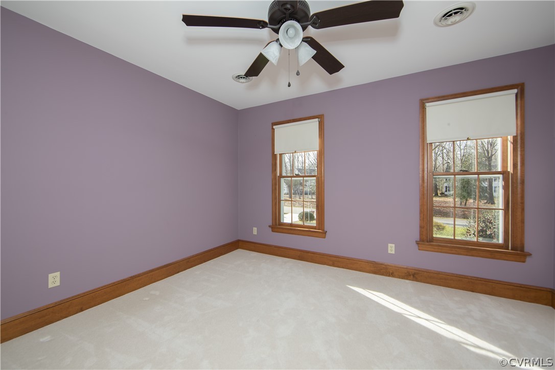 12905 Rivers Bend Road Chester, VA 23836 - Photo 20 of 27 The third bedroom is spacious and offers a ceiling