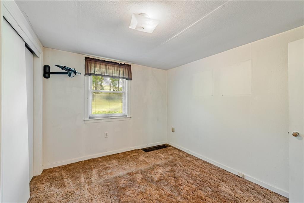 3018 Richey Road Connellsville, PA 15425 - Photo 20 of 27 an empty room with a window