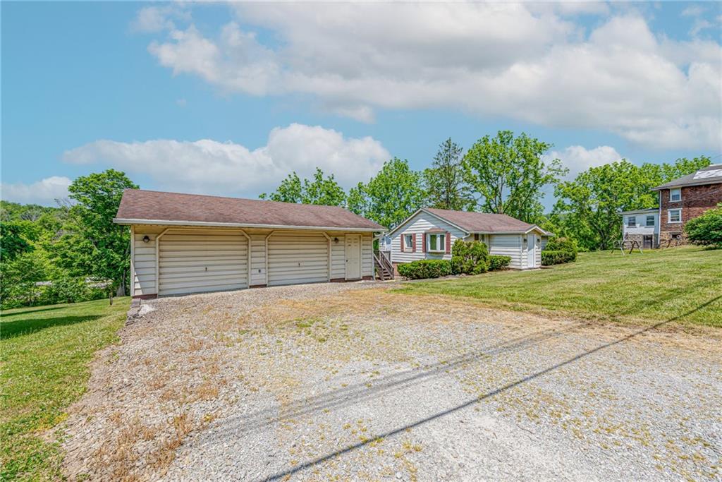 3018 Richey Road Connellsville, PA 15425 - Photo 22 of 27 a view of a house with a yard