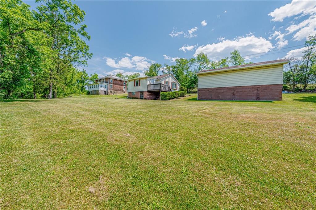 3018 Richey Road Connellsville, PA 15425 - Photo 23 of 27 a front view of house with yard and trees