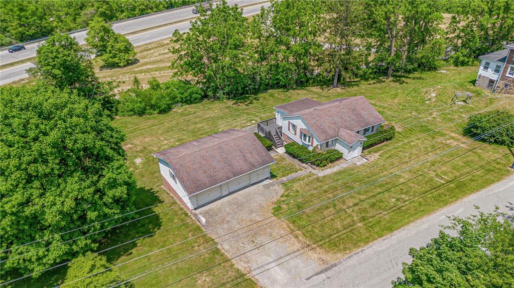 3018 Richey Road Connellsville, PA 15425 - Photo 25 of 27 a view of a backyard with potted plants