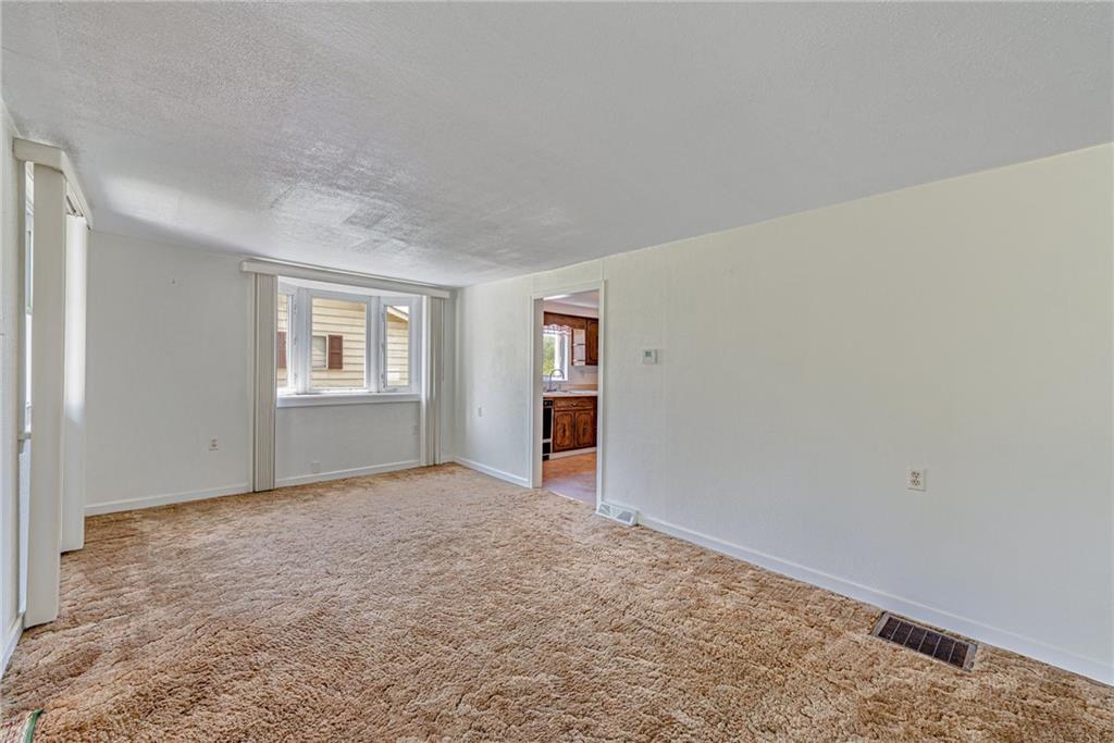 3018 Richey Road Connellsville, PA 15425 - Photo 7 of 27 an empty room with windows