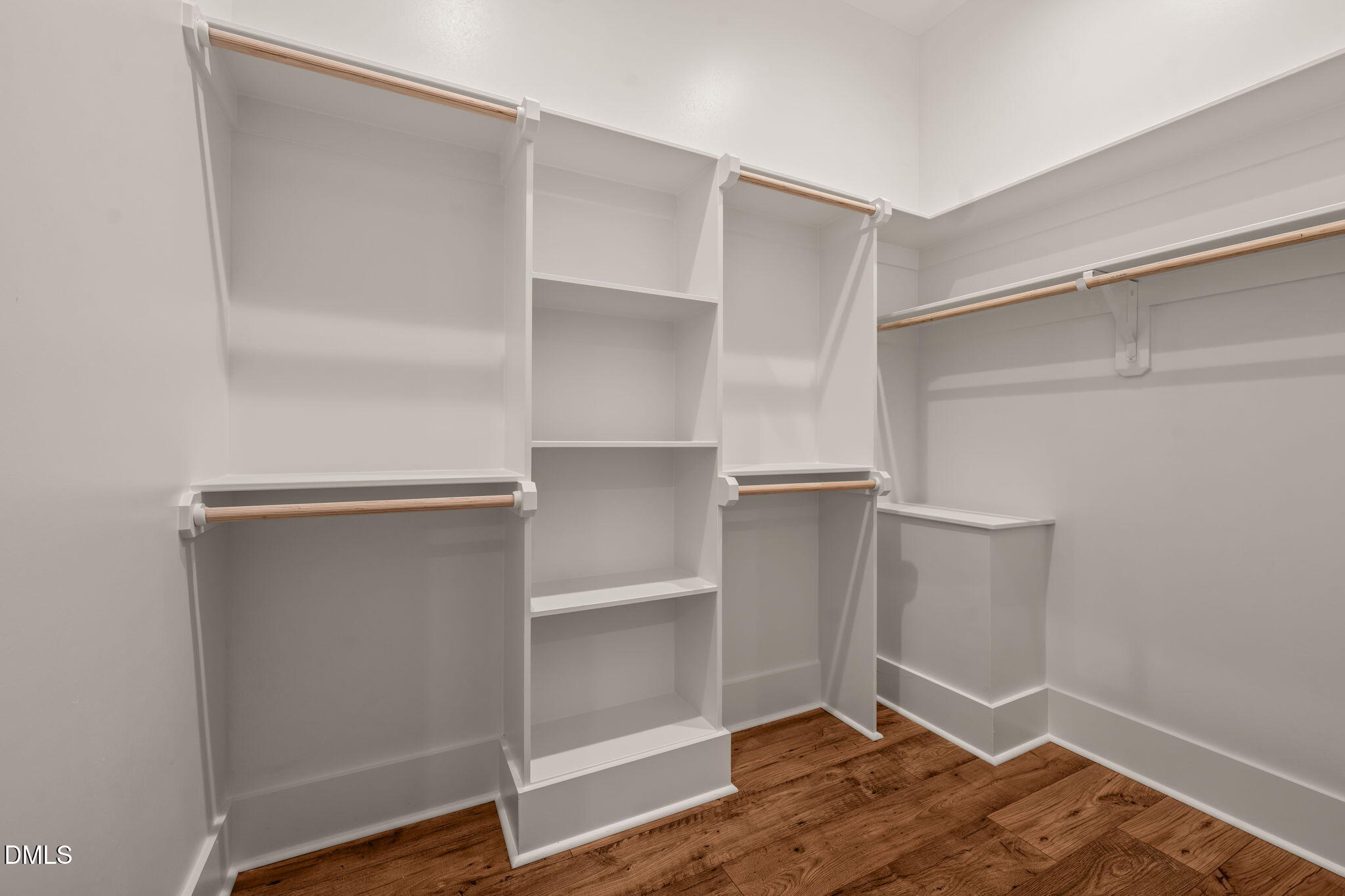 400 Pilot Ridge Road Zebulon, NC 27597 - Photo 32 of 51 a view of an empty walk in closet with empty racks