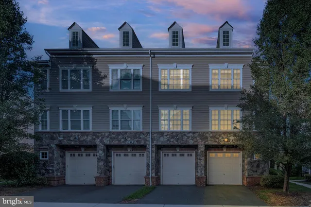 a front view of house with a yard