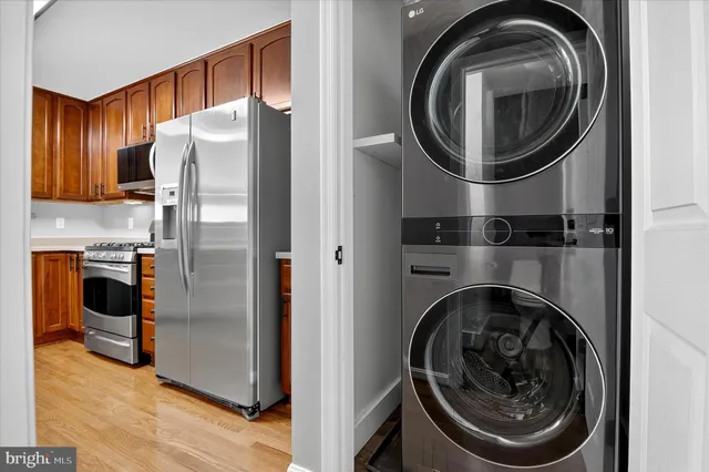 a view of livingroom with hardwood floor and hallway