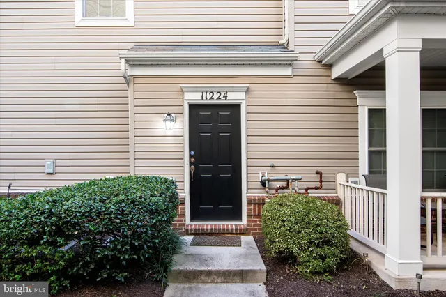 a room with wooden floor and cabinet