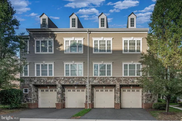 a view of an empty room with a fireplace
