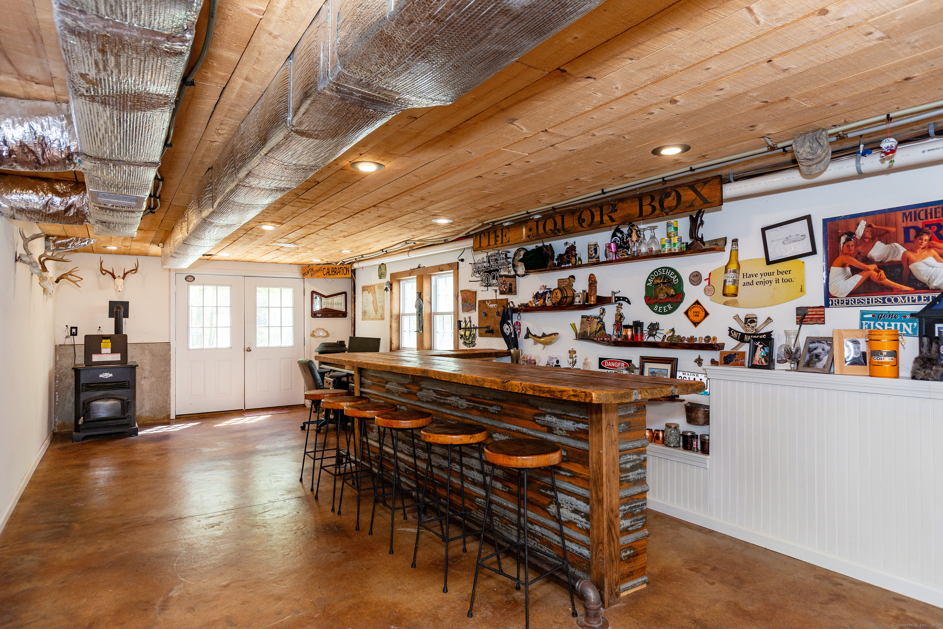 127 Massapeag Road Montville, CT 06382 - Photo 29 of 39 a room with lots of wooden furniture and furniture