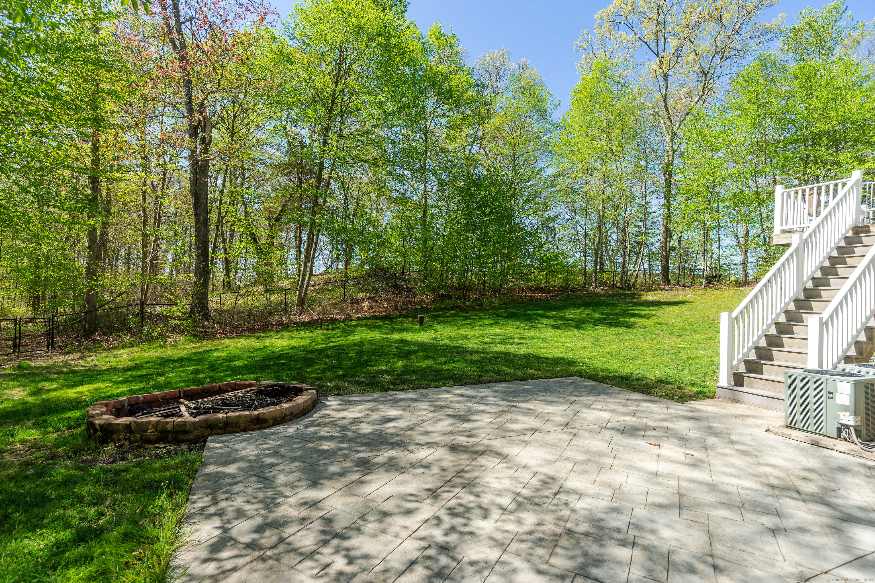 127 Massapeag Road Montville, CT 06382 - Photo 32 of 39 a view of a backyard with large trees