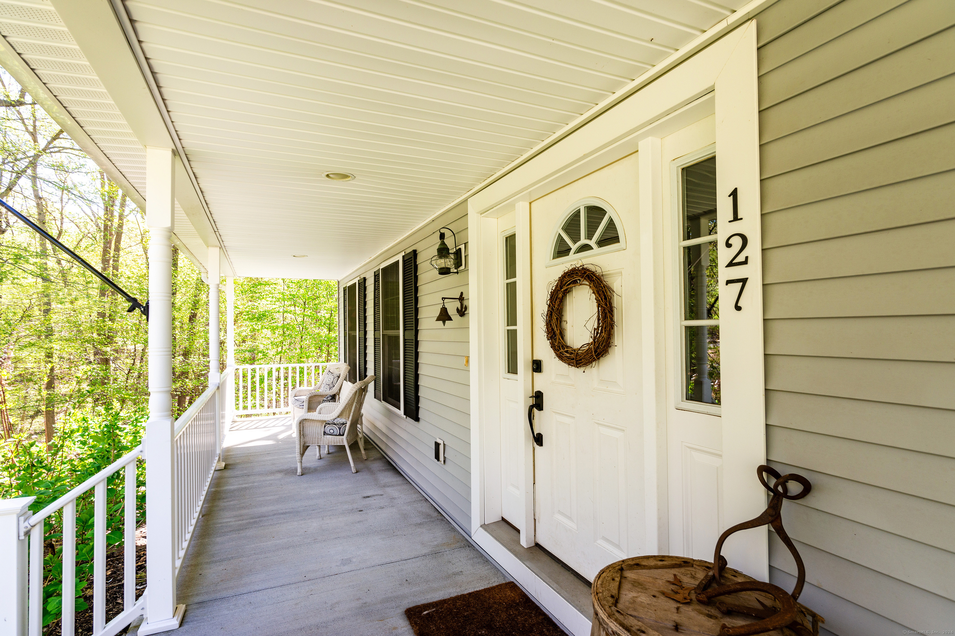 127 Massapeag Road Montville, CT 06382 - Photo 5 of 39 a view of a porch with wooden floor