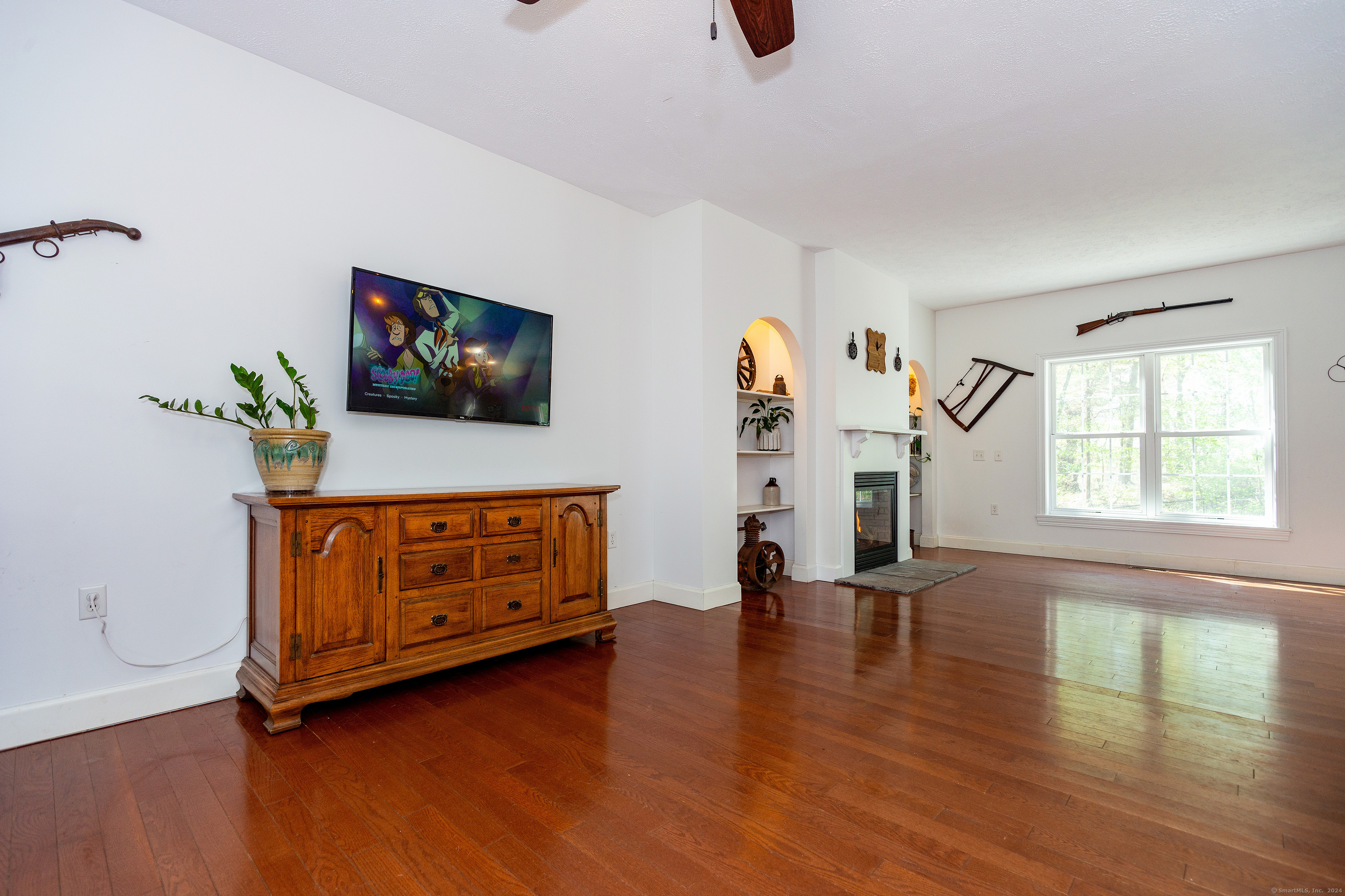 127 Massapeag Road Montville, CT 06382 - Photo 9 of 39 a living room with furniture and a flat screen tv