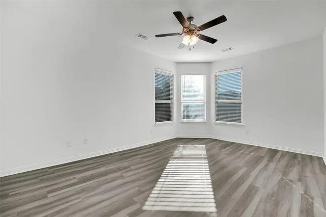 a view of a kitchen with a sink and a stove top oven