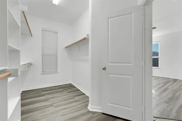 a view of a room with white walls